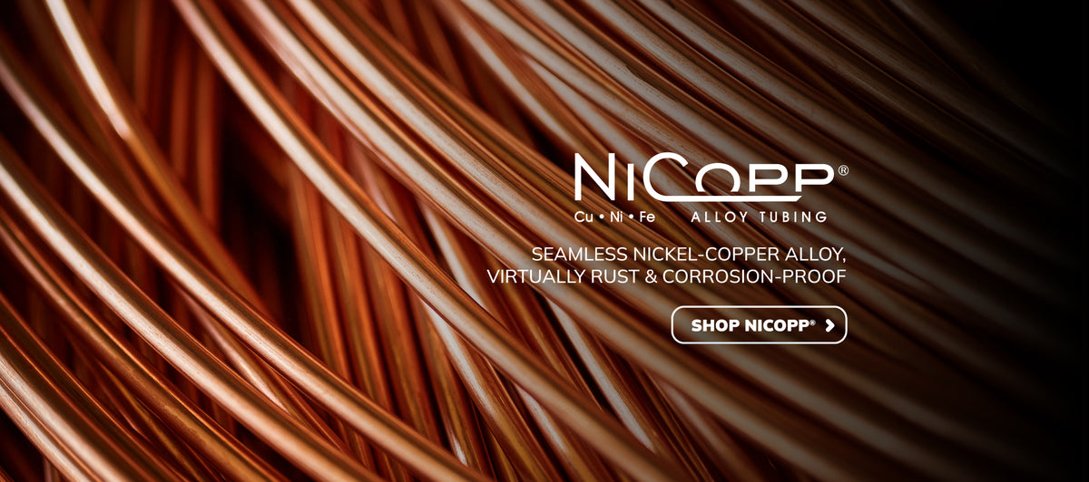 Close-up of NiCopp alloy tubing with brand name and product description.